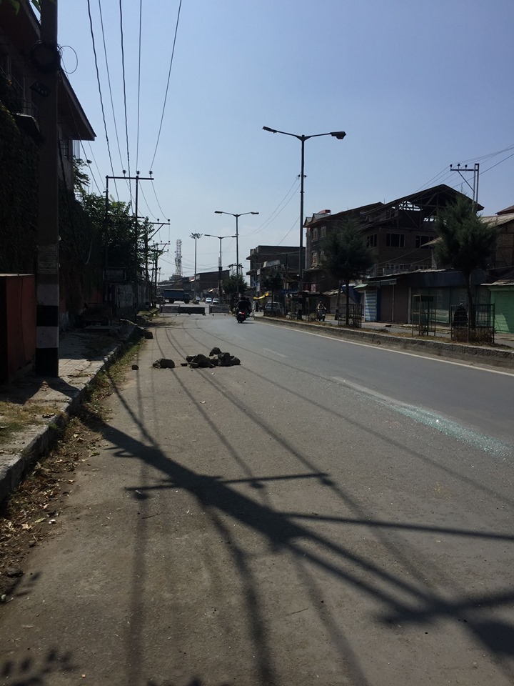 Empty streets with glass shards from protests