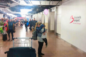 Sisters hugging in Brussels airport 2018