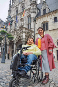Mahyar and his wife Faranak in front of the city hall of Mechelen
